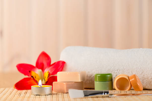 istock cosmetics for spa in a romantic setting with candles 637158474