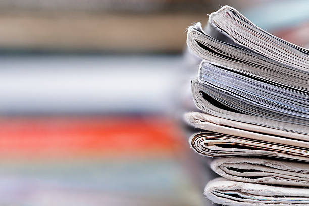 istock Stack of newspaper and magazines with copy space 637160312