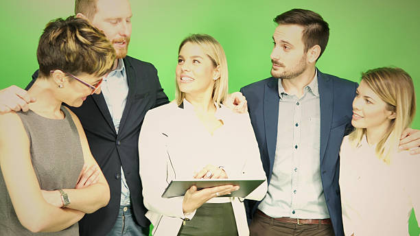 istock Group of business people at chroma key background 637163052