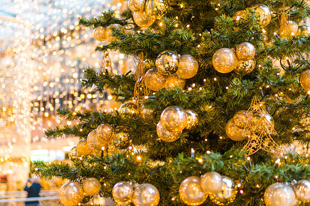 istock Beautiful and festive christmas tree at shopping mall 637163924