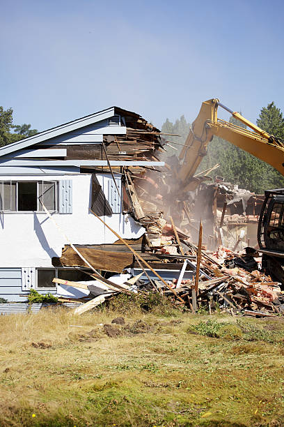 istock Demolishing, building teardown 637164588
