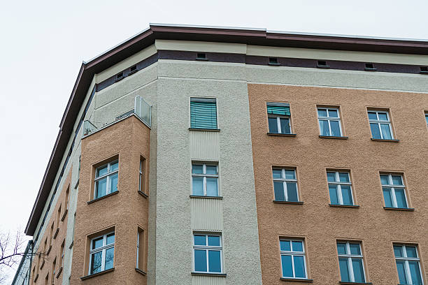 istock orange and yellow facaded corner house at berlin 637166100