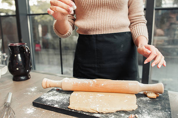 istock Unrecognizable woman rolling out dough free space 637166308