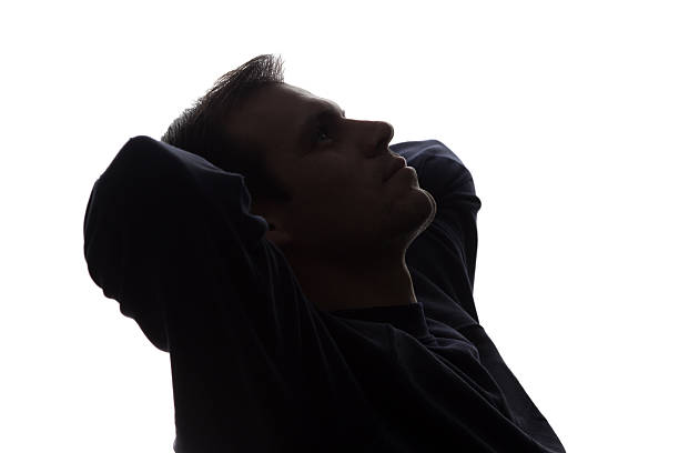 istock The young man thought, relax - silhouette 637166604