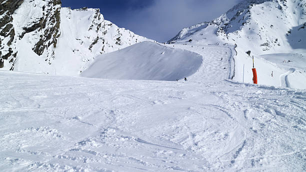 istock Mogul slope with fresh snow in high mountains 637169104