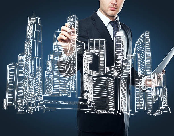 istock Businessperson drawing business sketch 637169308
