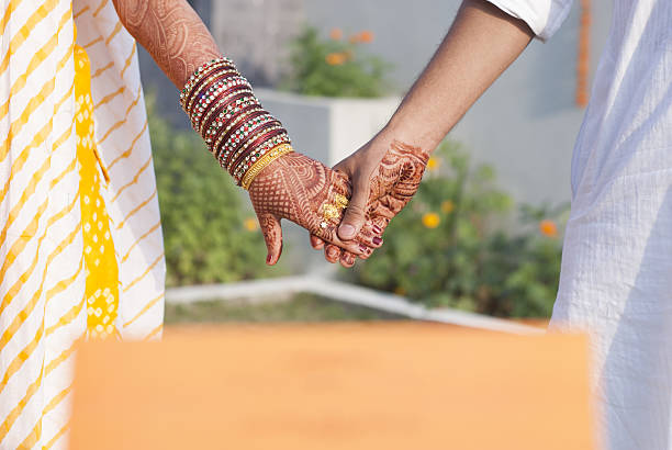 Indian Married Couple Holding Hands Stock Photo - Download Image Now -  Wedding, Holding Hands, Culture of India - iStock