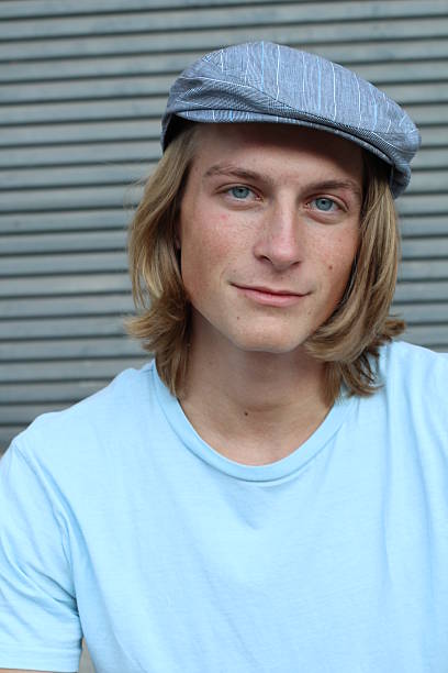 Portrait of young man in office smiling