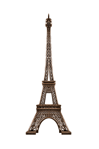 Souvenir model of the Eiffel Tower isolated on a white background.