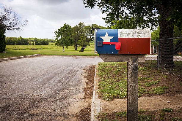 Mailbox painted with the Texas Flag Mailbox painted with the Texas Flag in a street in Texas, USA mailbox photos stock pictures, royalty-free photos & images