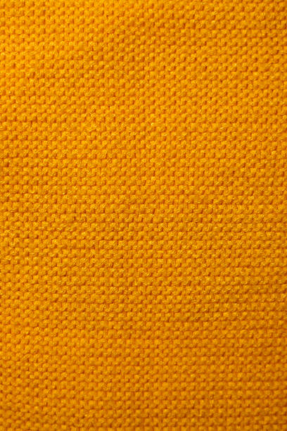 texture tricotée en laine jaune - knitting vertical striped textile photos et images de collection