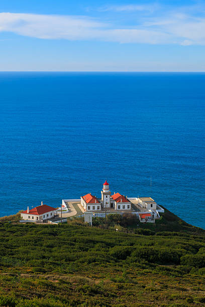 istock Lighthouse in Cabo Mondego in the cliff 637176866