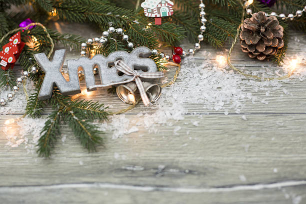 istock Christmas wooden background with fir branches 637179460