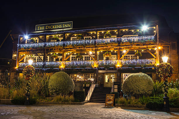 The Dickens Inn Public House in London London, UK - December 24th 2015: The beautiful Dickens Inn Public House located in St. Katherine Docks in London. charles dickens stock pictures, royalty-free photos & images