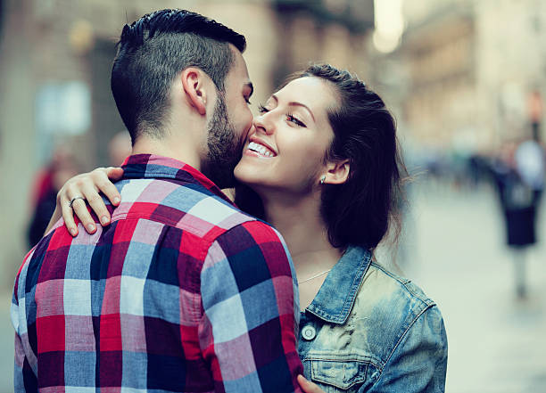 istock Happy girl hugging her male 637180120