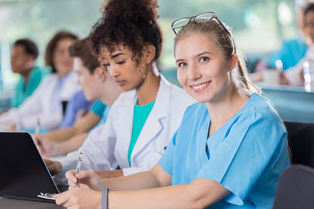 istock Confident Caucasian medical student takes notes in class 637181756