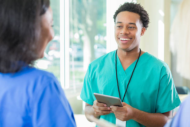 istock African American male medical student talks with classmate 637182066