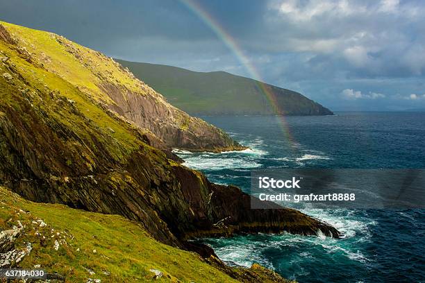 Rainbow At The Coast Of Slea Head In Ireland Stock Photo - Download Image Now - Rainbow, Landscape - Scenery, Scenics - Nature