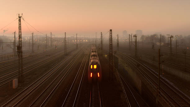 istock railroad tracks in foggy Munich 637184298