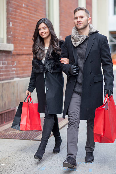istock Fashionable couple going shopping 637185058