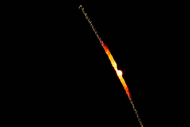 istock Glowing sprakler after burning  at black background 637185566
