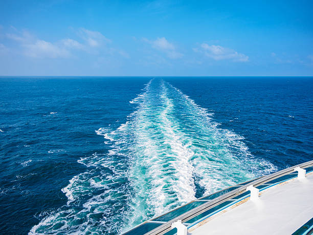 istock Ocean wake from cruise ship, on bright summer day. 637187354