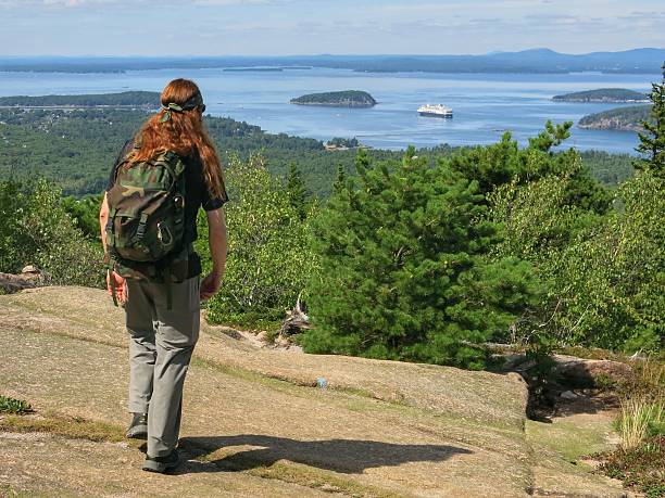 istock Champlain Mountain Precipice Trail Man Decending, Acadia National Park, Maine 637188998