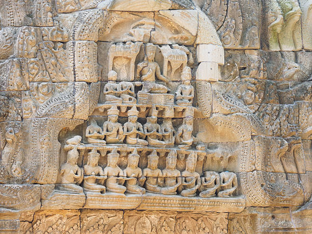 istock Bayon Stone decorations on the walls in Angkor Wat 637189368