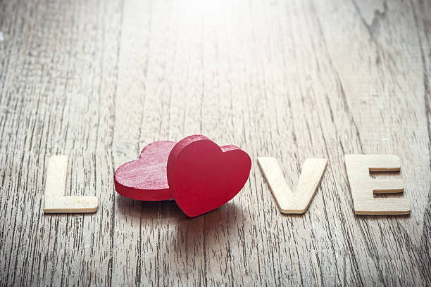 istock Valentines day background with two red hearts 637190264