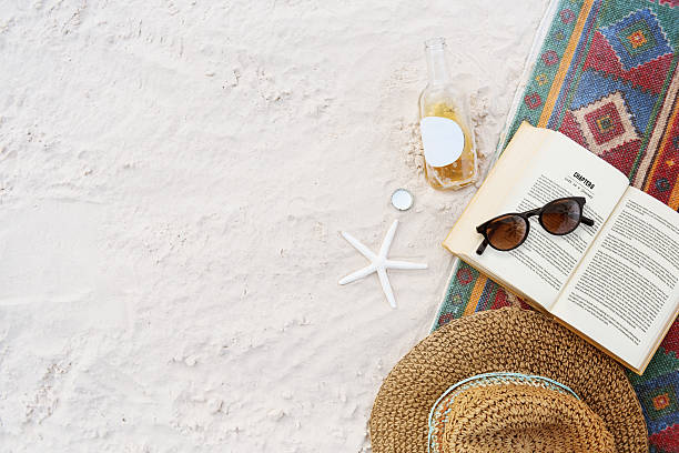istock Beach Summer Holiday Vacation Book Leisure Relaxation Concept 637191862