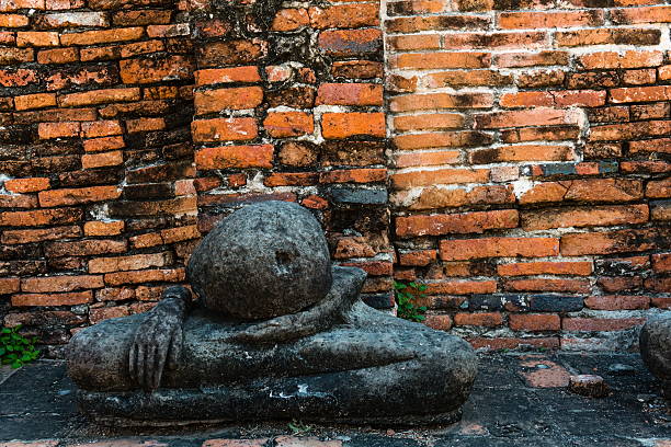 istock Broken buddha statue, taken outdooor in afternoon 637192724