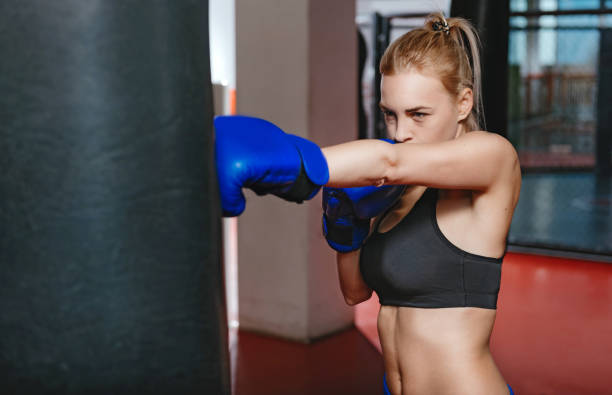 istock Beautiful strong girl working on her punch 637196500