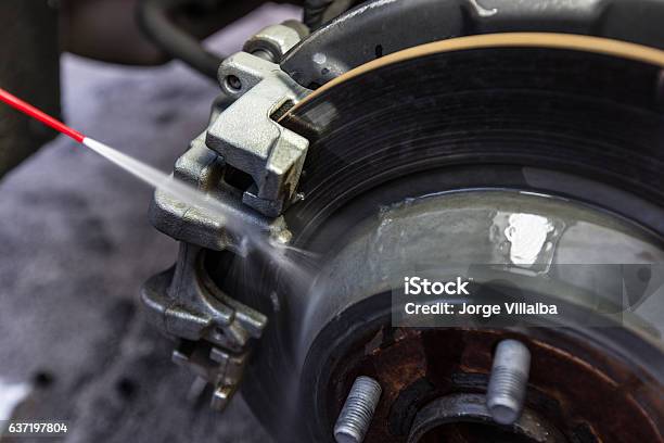 Cleaning Car Brake Pad And Disc With Caliper Stock Photo - Download Image Now - Brake, Cleaning, Cleaner