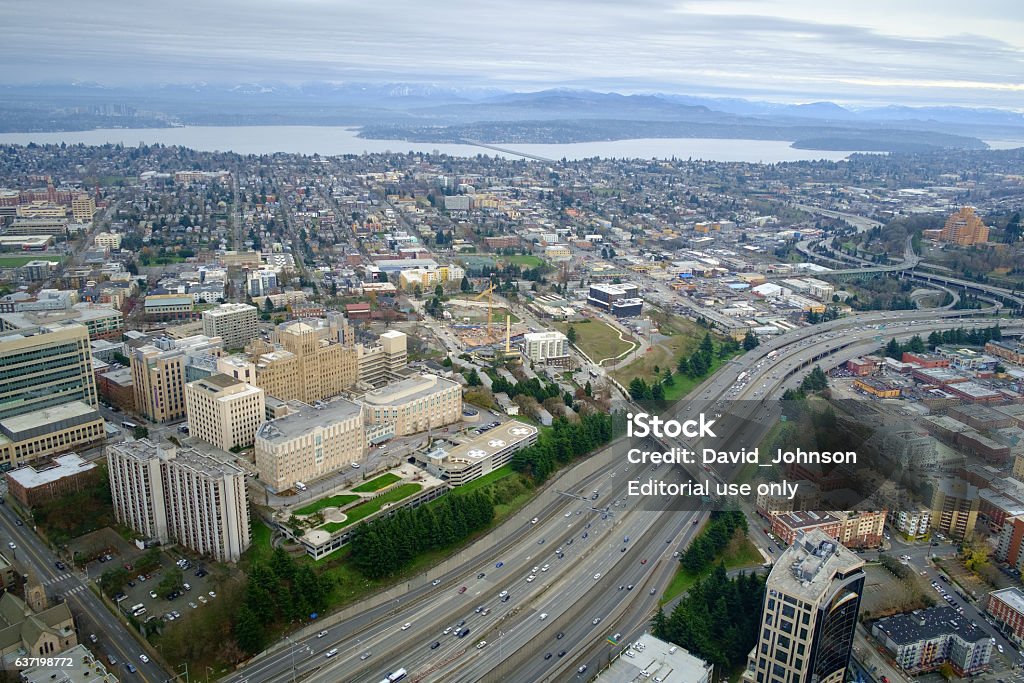 Harborview Medical Center, Seattle, WA Seattle, WA, USA December 18, 2016: Harborview Medical Center with Interstate Highway 5 in foreground and Lake Washington and Interstate 90 in background Seattle Stock Photo