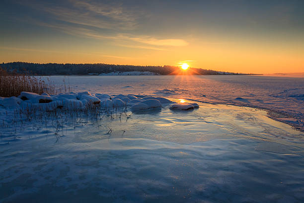 istock Winter landscape frozen ocean and sunrise 637199106