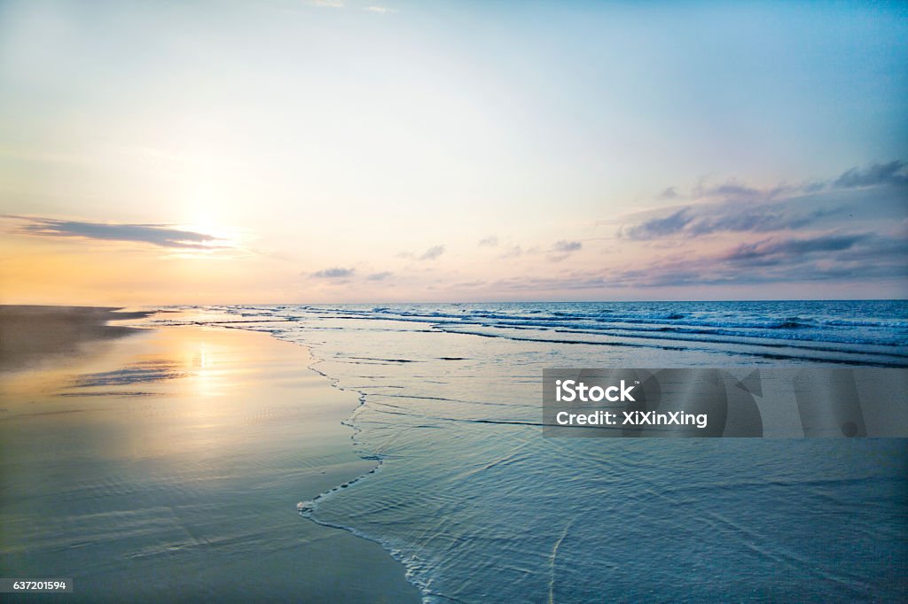 View of beach sunrise Beach Stock Photo