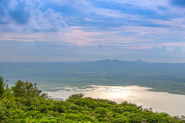istock Lam Takong reservoir dam with sunlight 637201646