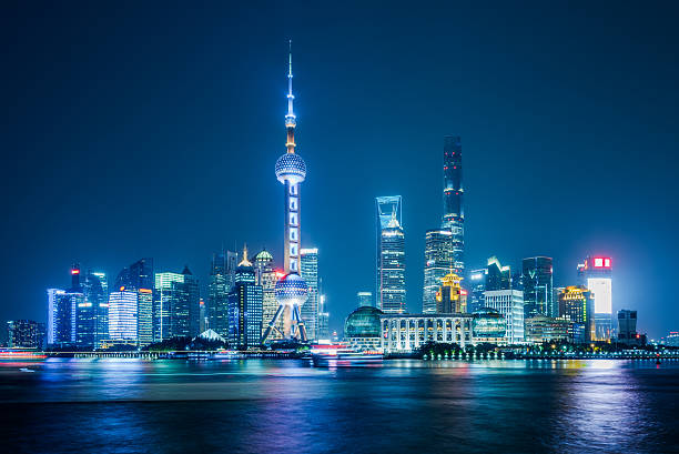 istock City skyline lit up at night 637204568