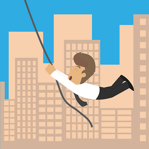 istock businessman a rope across the building, the risk and excitement 637204652