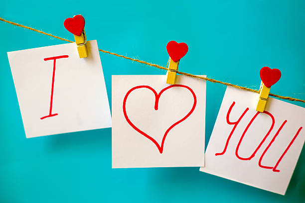 istock Paper stickers hanging on heart shape pins and pack-thread 637206134
