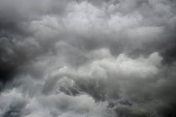 istock Storm. Dark sky with black clouds for background. Intentionally 637206266