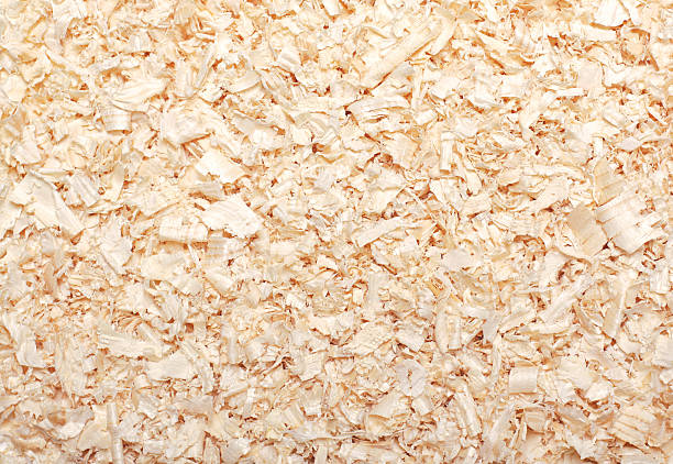 wood sawdust texture material background closeup, top view - shavings imagens e fotografias de stock