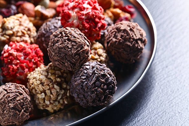 istock Homemade candy with chocolate , nuts and dried strawberry 637211568