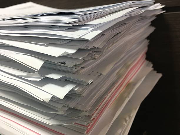 istock Stack of business report paper files 637211936