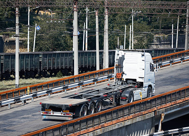 istock empty truck on road, cargo transportation, delivery and shipping concept 637221932
