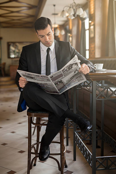 istock Businessman at the cafe 637224384