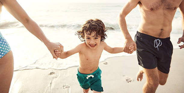 istock Laughing the day away at the beach 637225590
