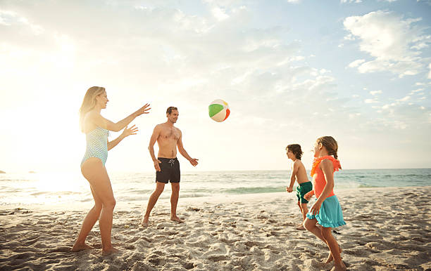 istock Family fun at the beach 637225826