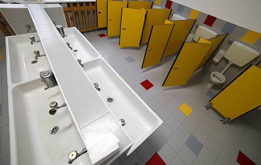 Modern toilet in white and different shades of grey.