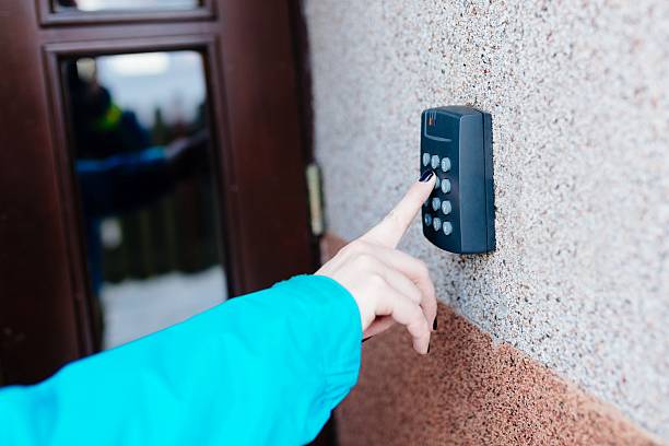 istock Woman opening house doors 637227482